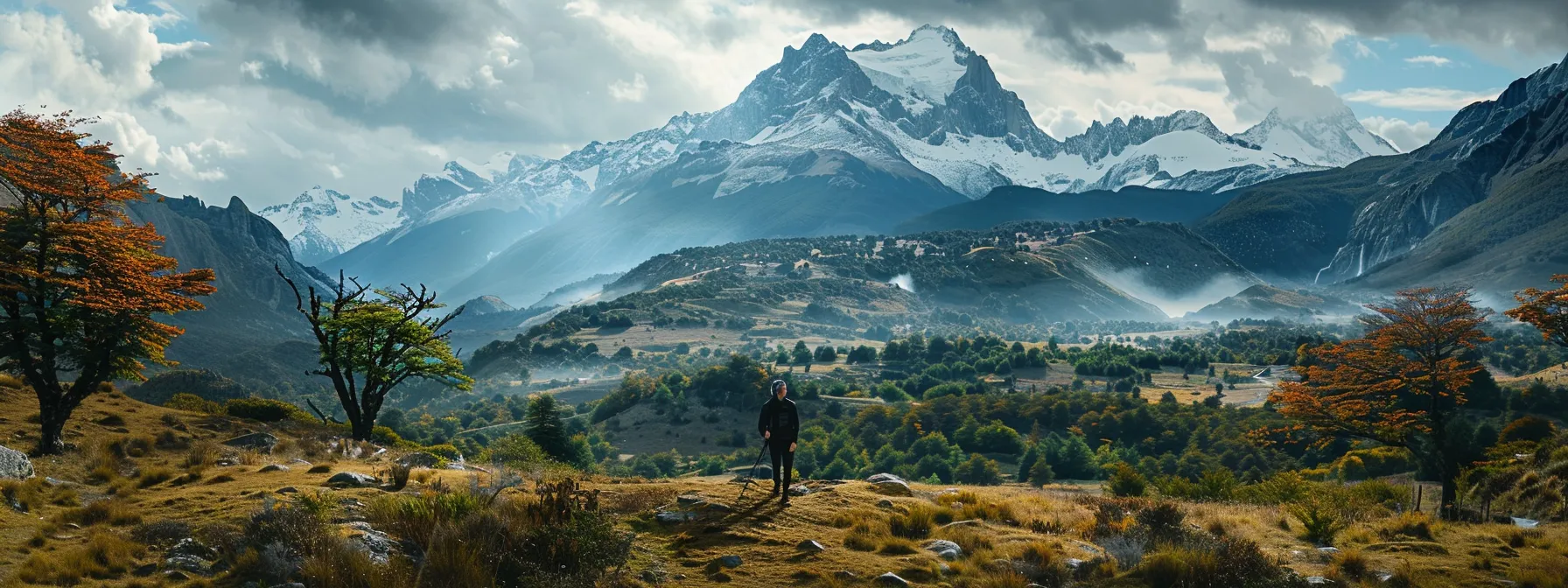 in a remote village in patagonia, chile, a lone traveler gazes in awe at the majestic, snow-capped peaks towering above a tranquil forest.