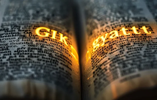 a vintage dictionary open to the page with the word "gyatt" highlighted in bright yellow.